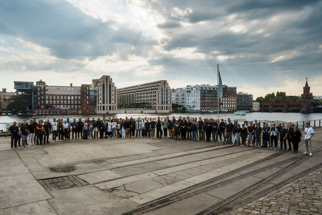 Upvest all hands photo infront of the Spree river, and the Upvest HQ in Berlin